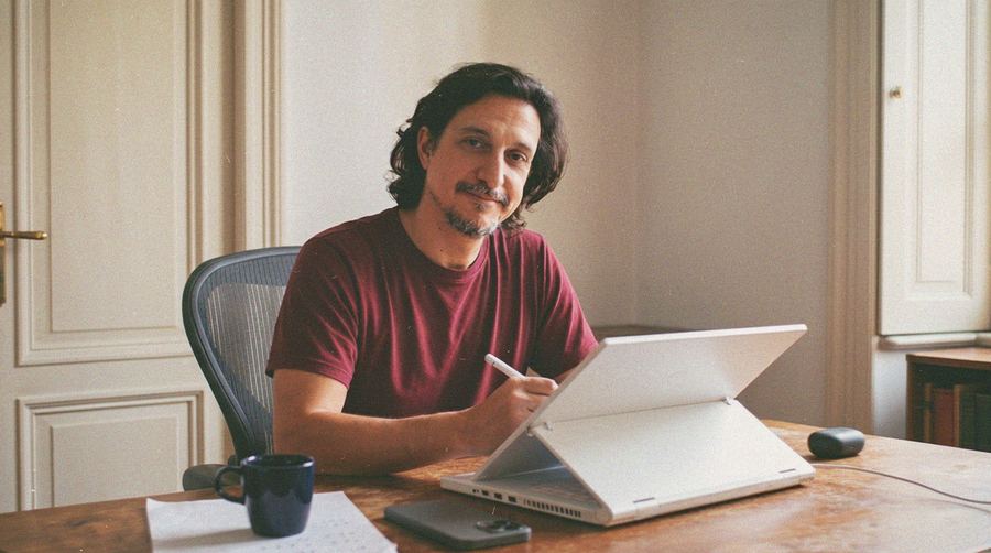 Dakota Warren at his drawing desk
